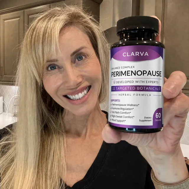 A person holding a CLARVA PERIMENOPAUSE bottle